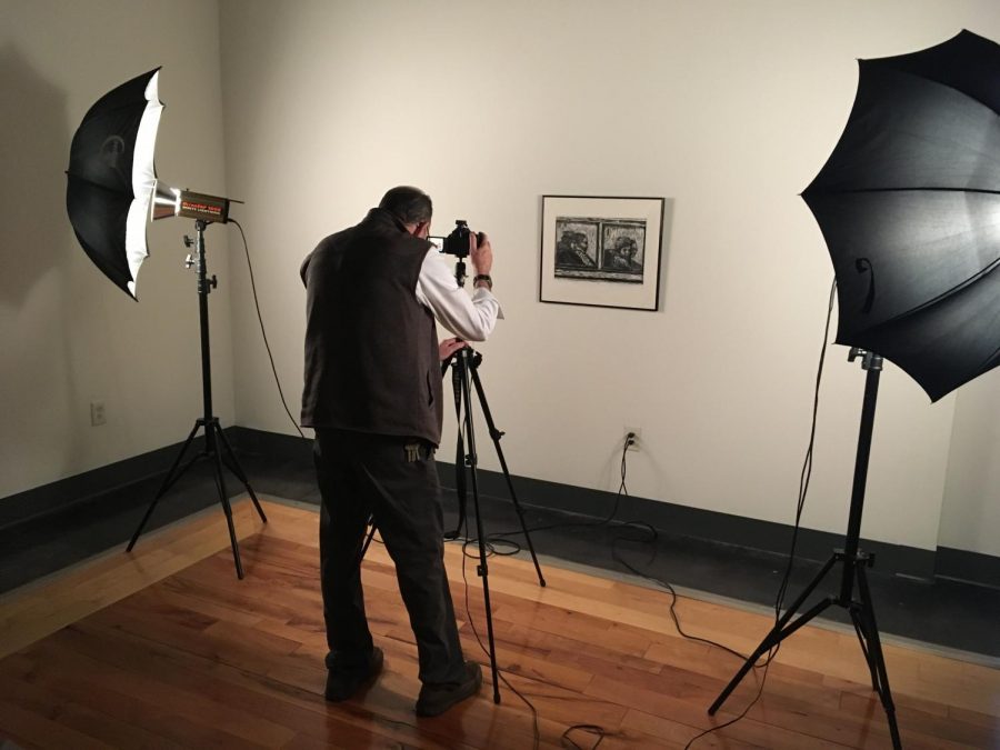 Joe Champagne photographs a piece for the online permanent collection.