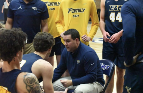 Coach Ben Thompson designs a play during the men’s basketball team’s 129 - 44 victory over Appalachian Bible College.